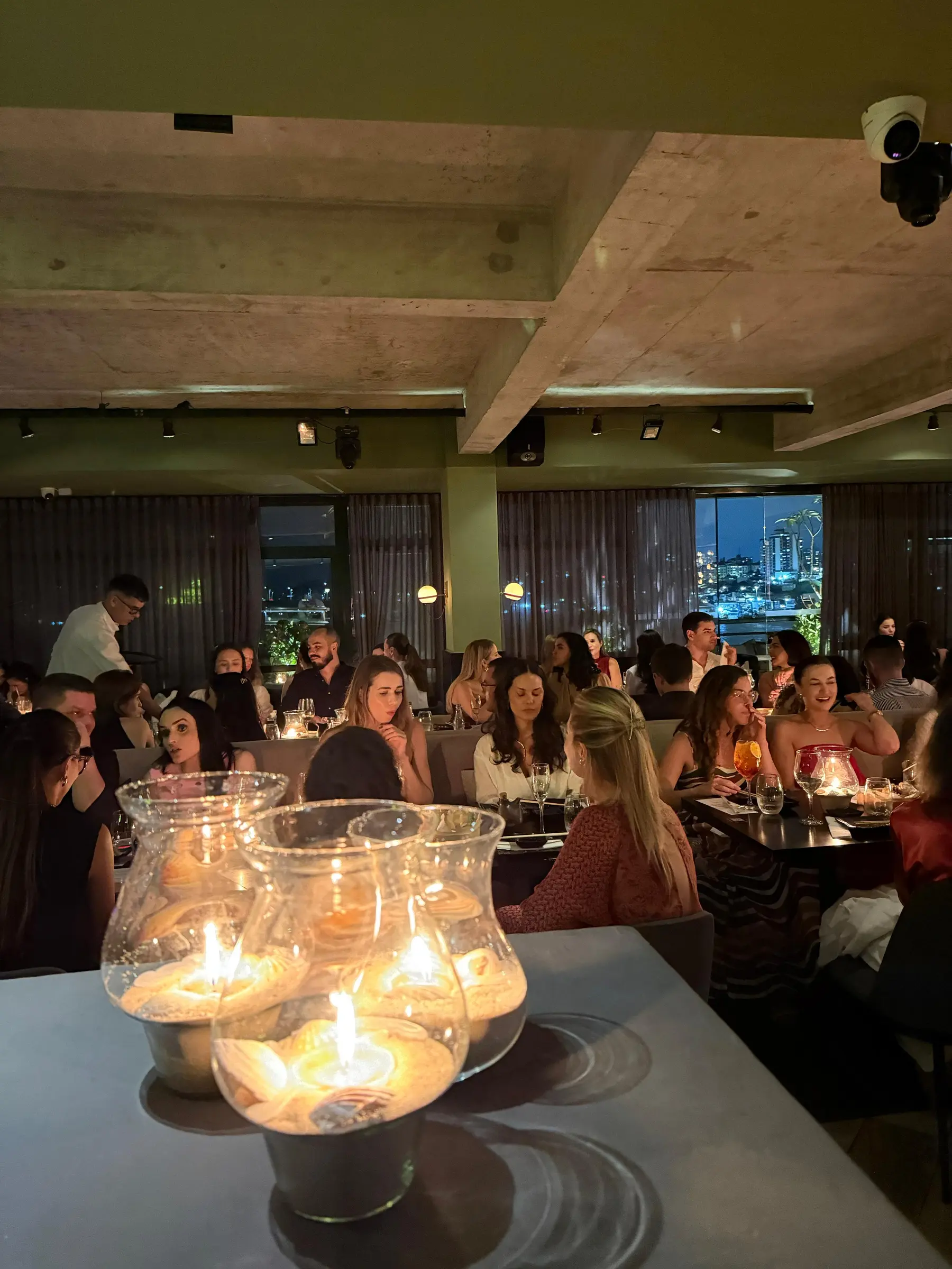 Guests celebrating at Noma Sushi
